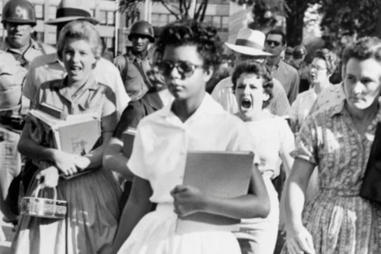 Elizabeth Eckford made history at age 15. Here’s the full story behind the iconic photo.